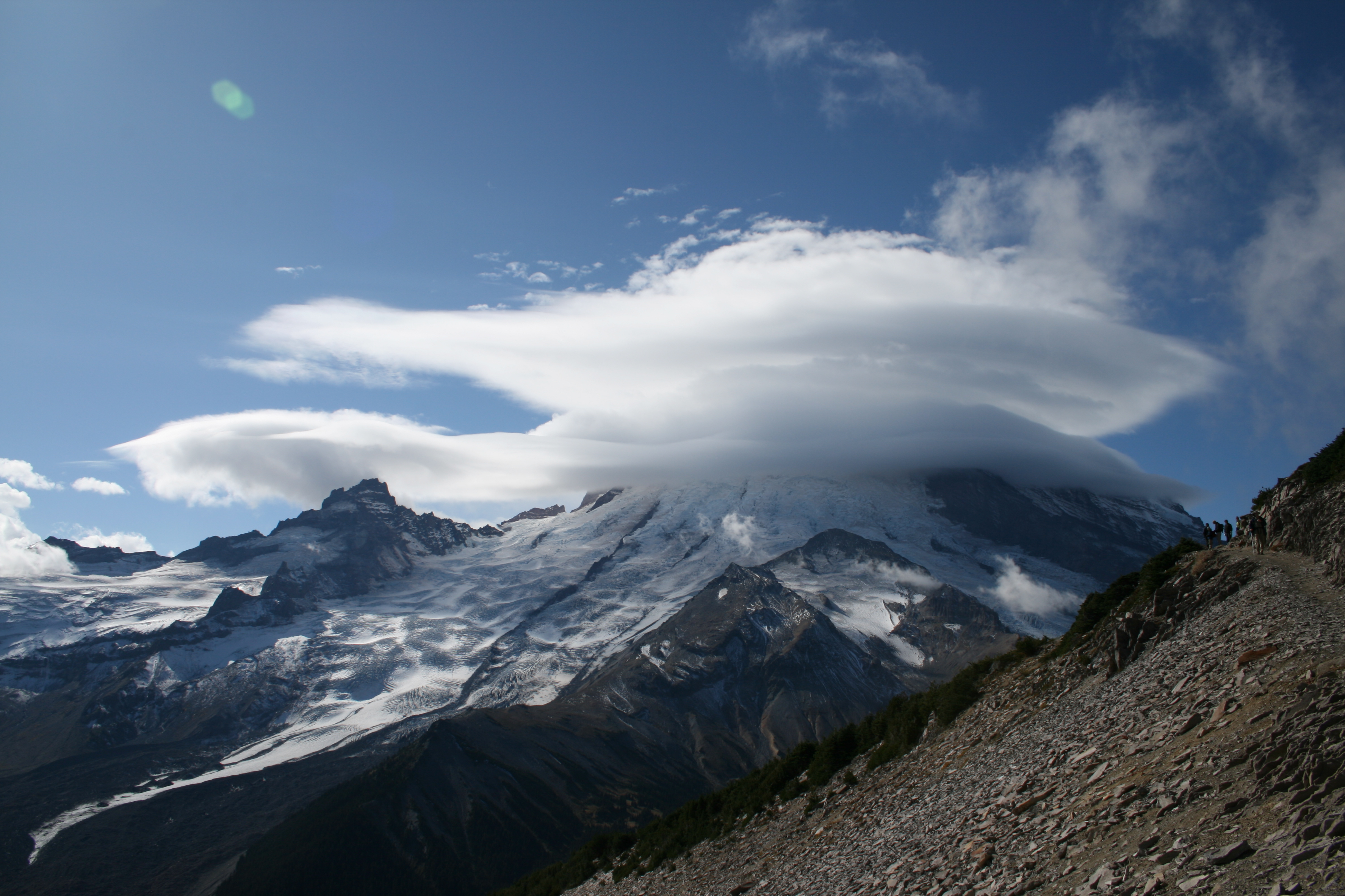 Lenticular clouds form over Mt. Rainier