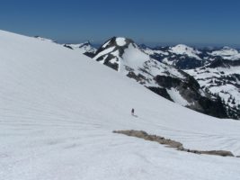 I look small in these large snow fields on our way to Mt. Hinman. You can still see La Bohn peak poking up behind me.