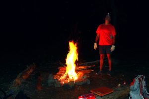 Dave stoking the fire at camp...Also, last known photo of my original seatcushion...Sigh...Sure gonna miss that seat cushion, we've been through so much together!!!
