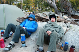 Greg and Dan, vainly trying to stay warm...Taken right before heading for the refuge of the rock shelf.