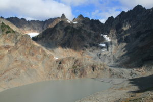 Mount Anderson, with West Peak needle in the background. What is left of the Anderson Glacier is the "lake" in front.
