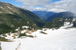 Trudging up snow field, above Summerland