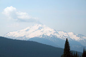 Glacier Peak, with clouds that look as if she blew her top.