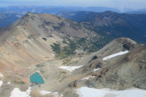 looking down into the Warm Lake from the ridge, can see Tieton Peak middle left, and Devils Horn, middle right.