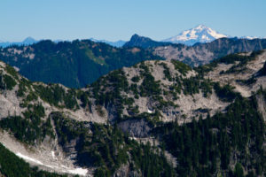 Further into the hike, we would pass a point where we could look across and see Glacier Peak rising up in the distance